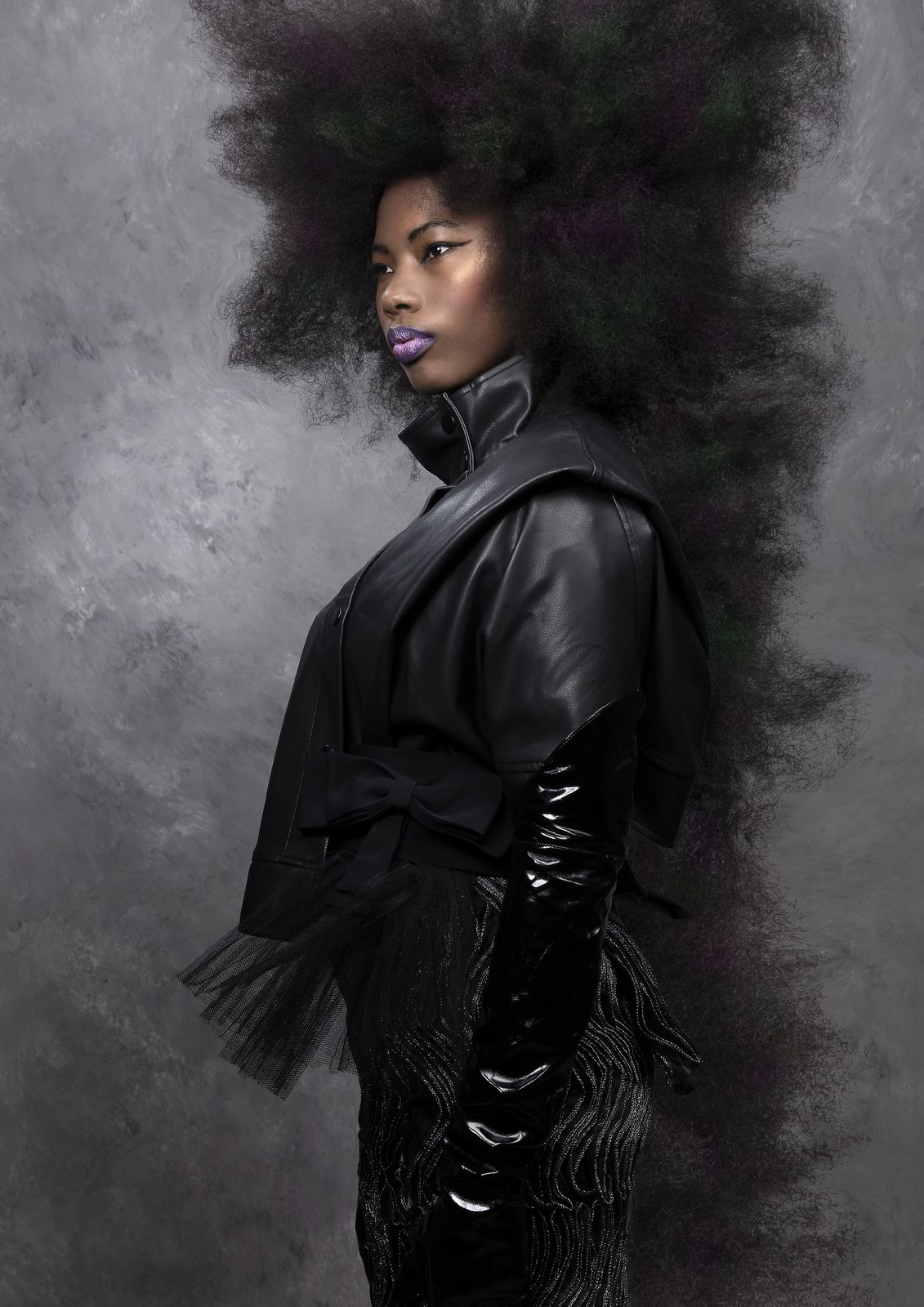 Two models in black editorial looks